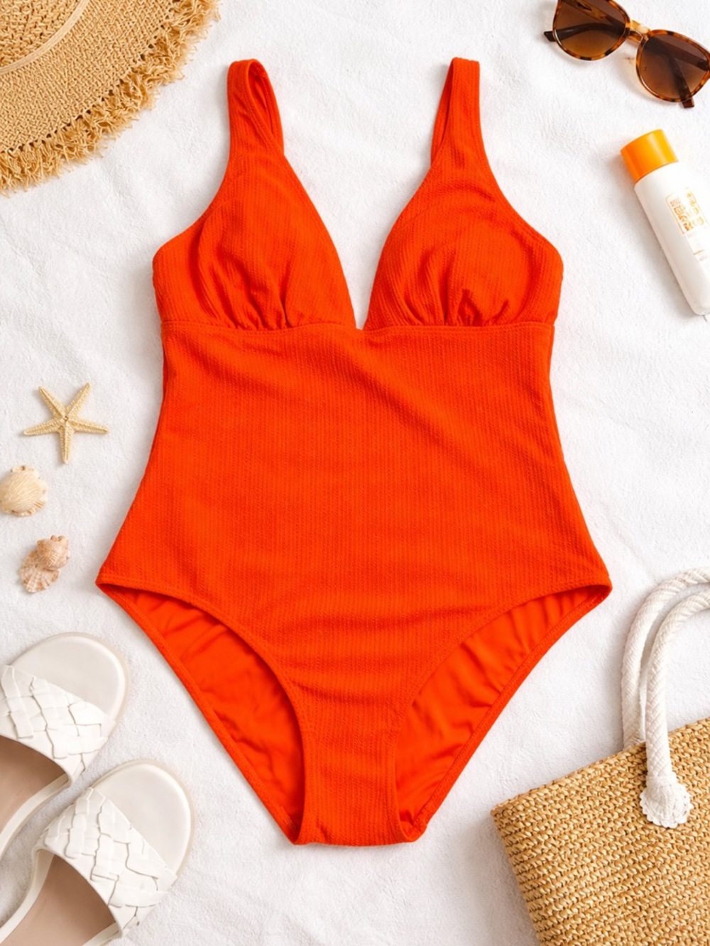 Orange one piece swimsuit from Primark. Size 12. Worn once.